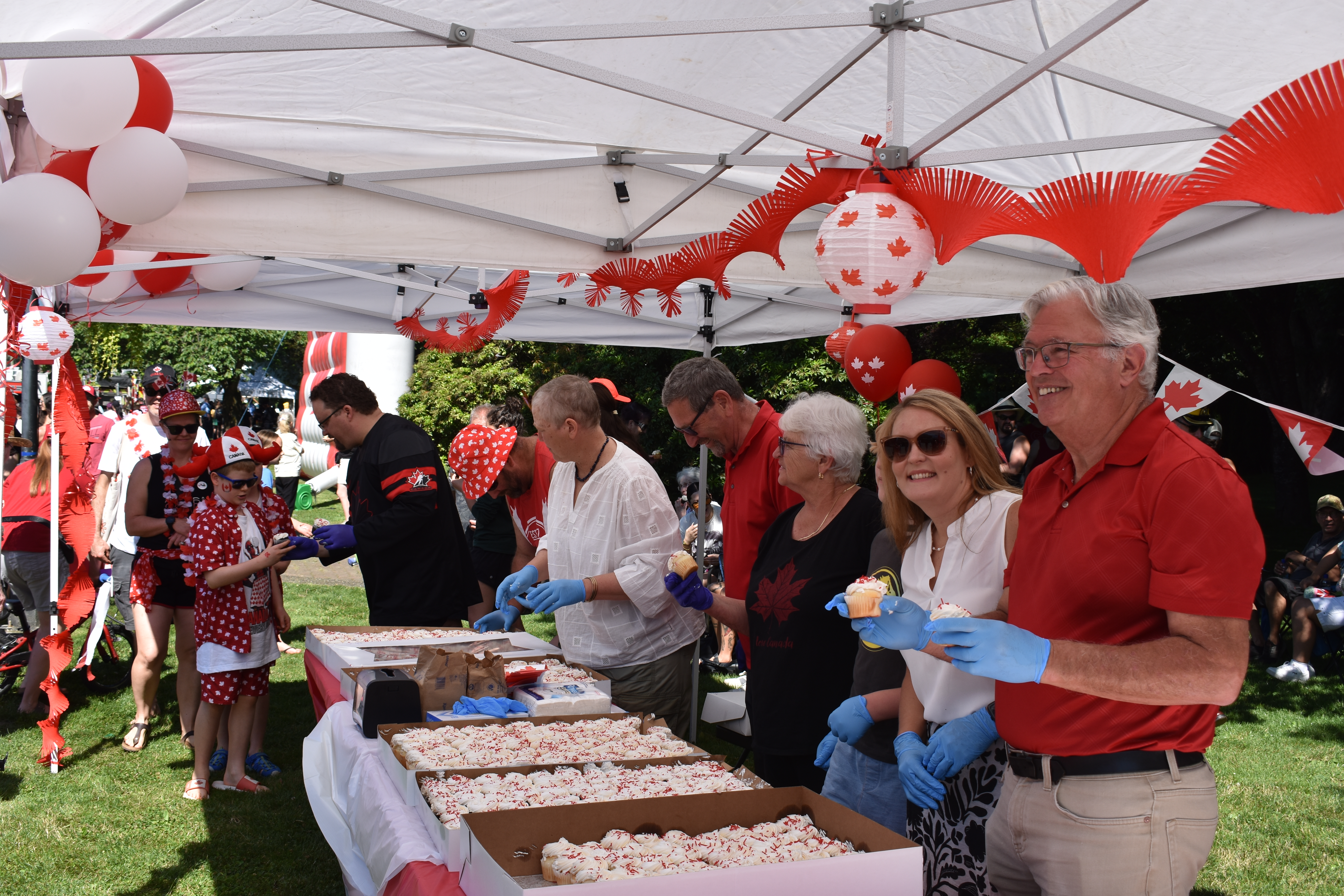 Mayor and Council on Canada Day Handing out Cupcakes